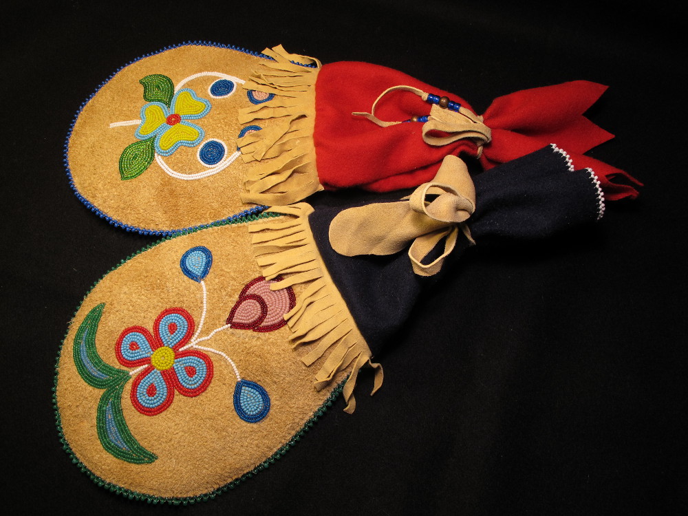 Blackfoot style buckskin woman bags